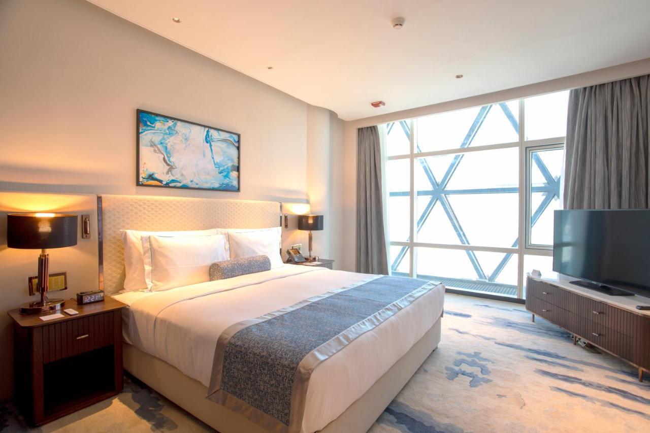 Century Marina Hotel - Lusail Esterno foto A bedroom at the hotel