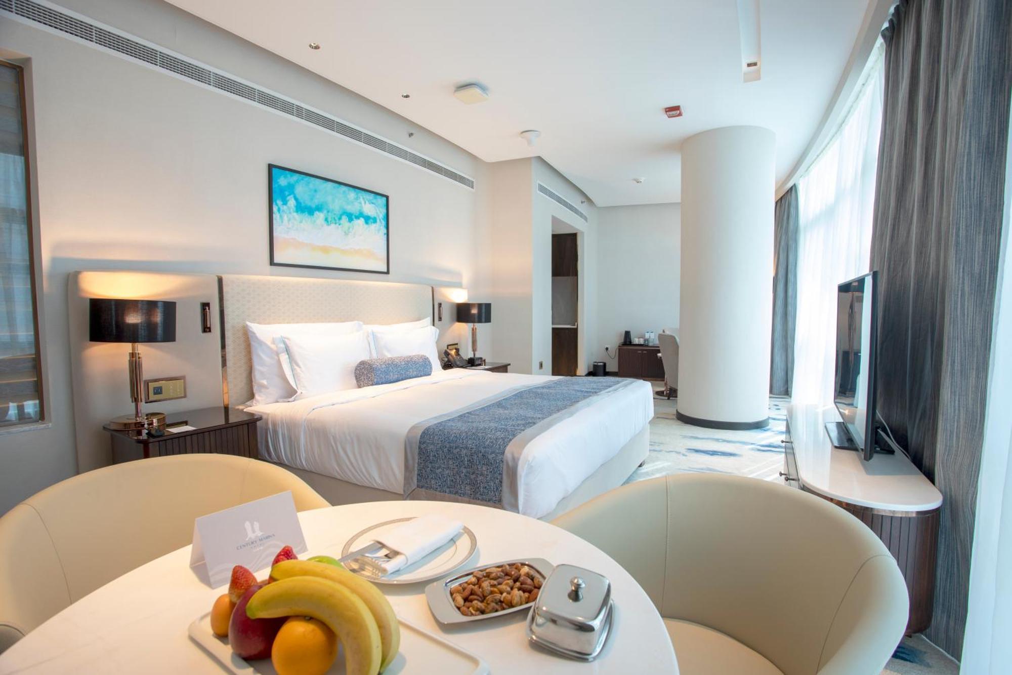 Century Marina Hotel - Lusail Esterno foto A bedroom at the hotel