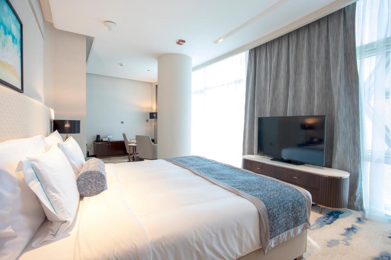 Century Marina Hotel - Lusail Esterno foto A bedroom at the hotel