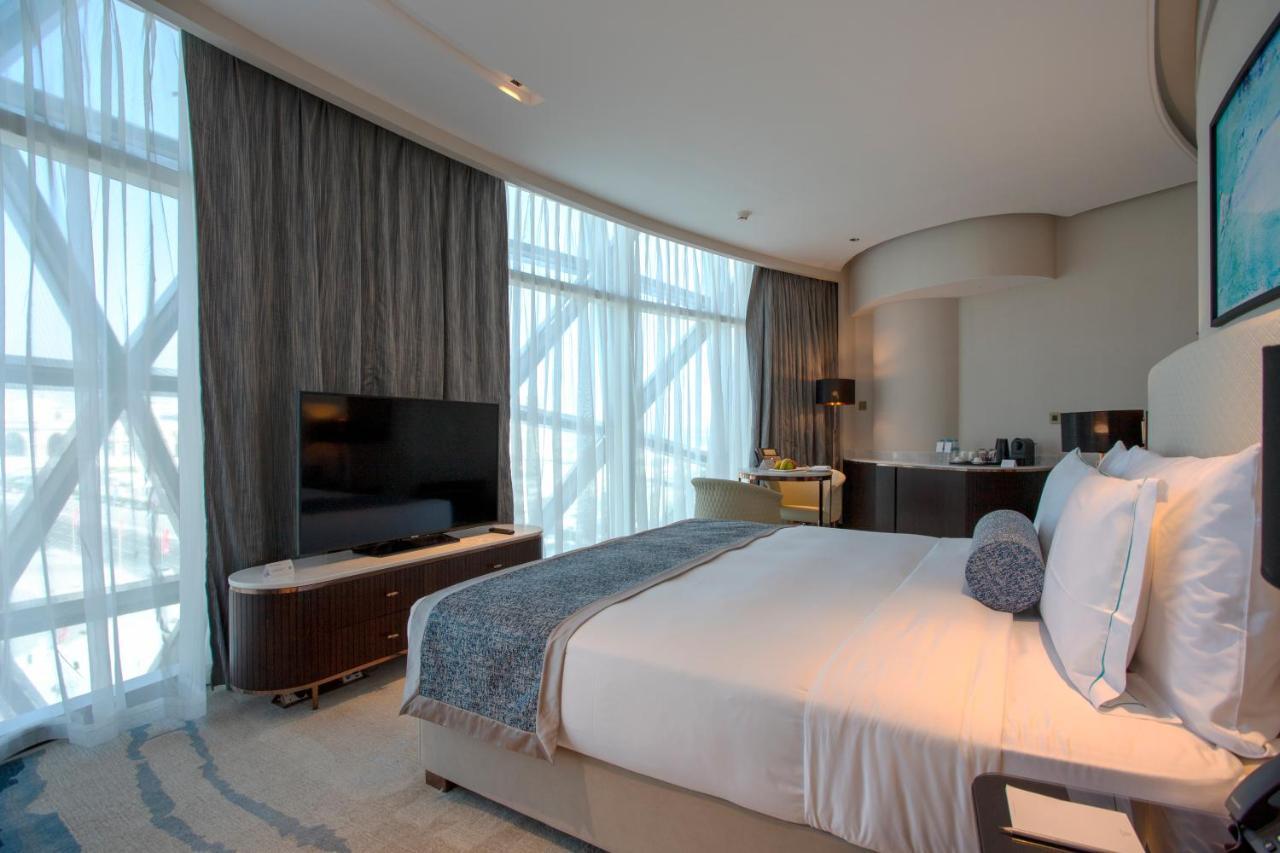 Century Marina Hotel - Lusail Esterno foto A bedroom at the hotel