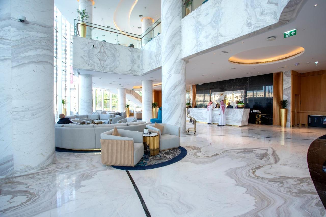 Century Marina Hotel - Lusail Esterno foto Lobby