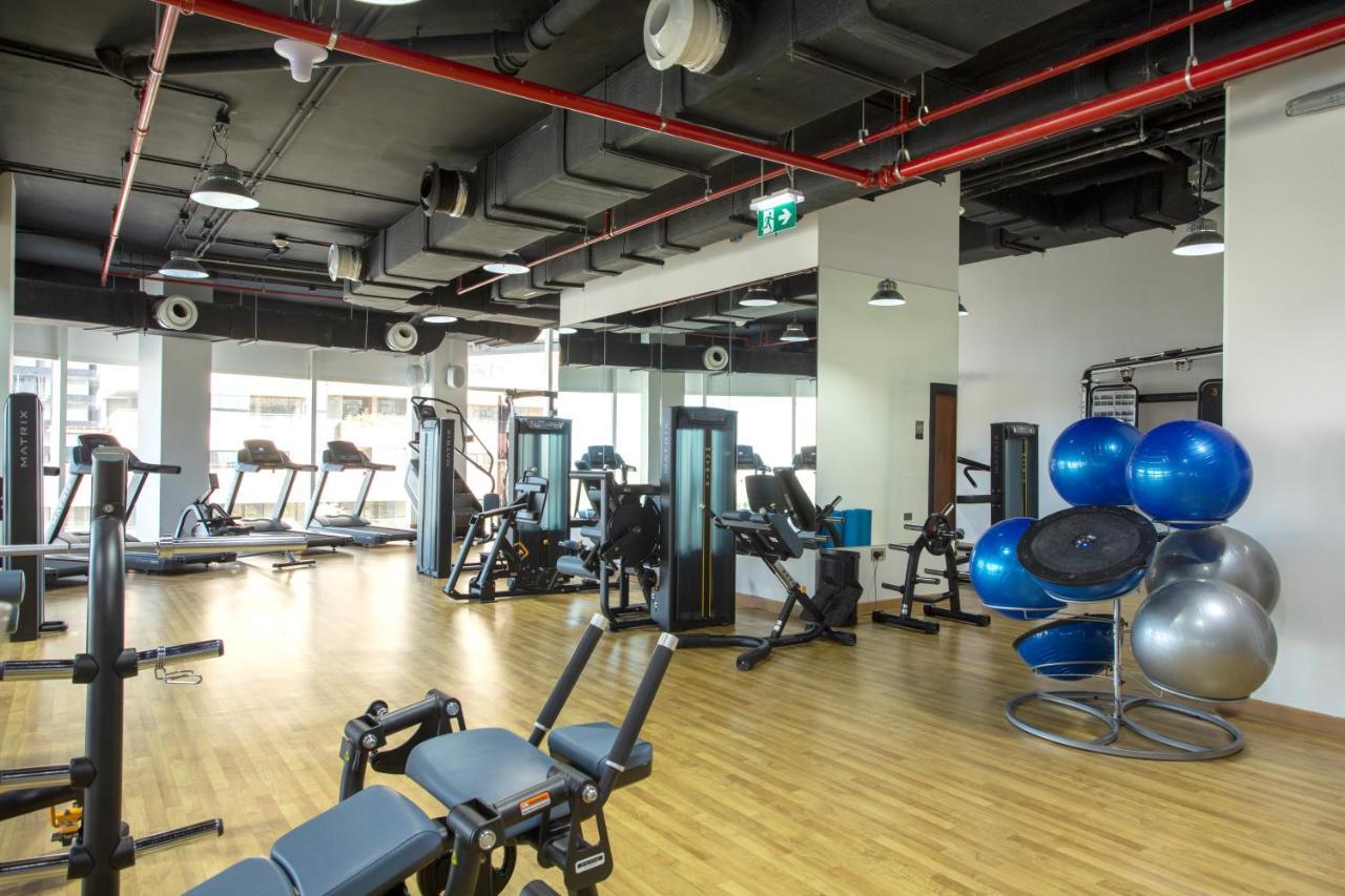 Century Marina Hotel - Lusail Esterno foto A gym in Singapore
